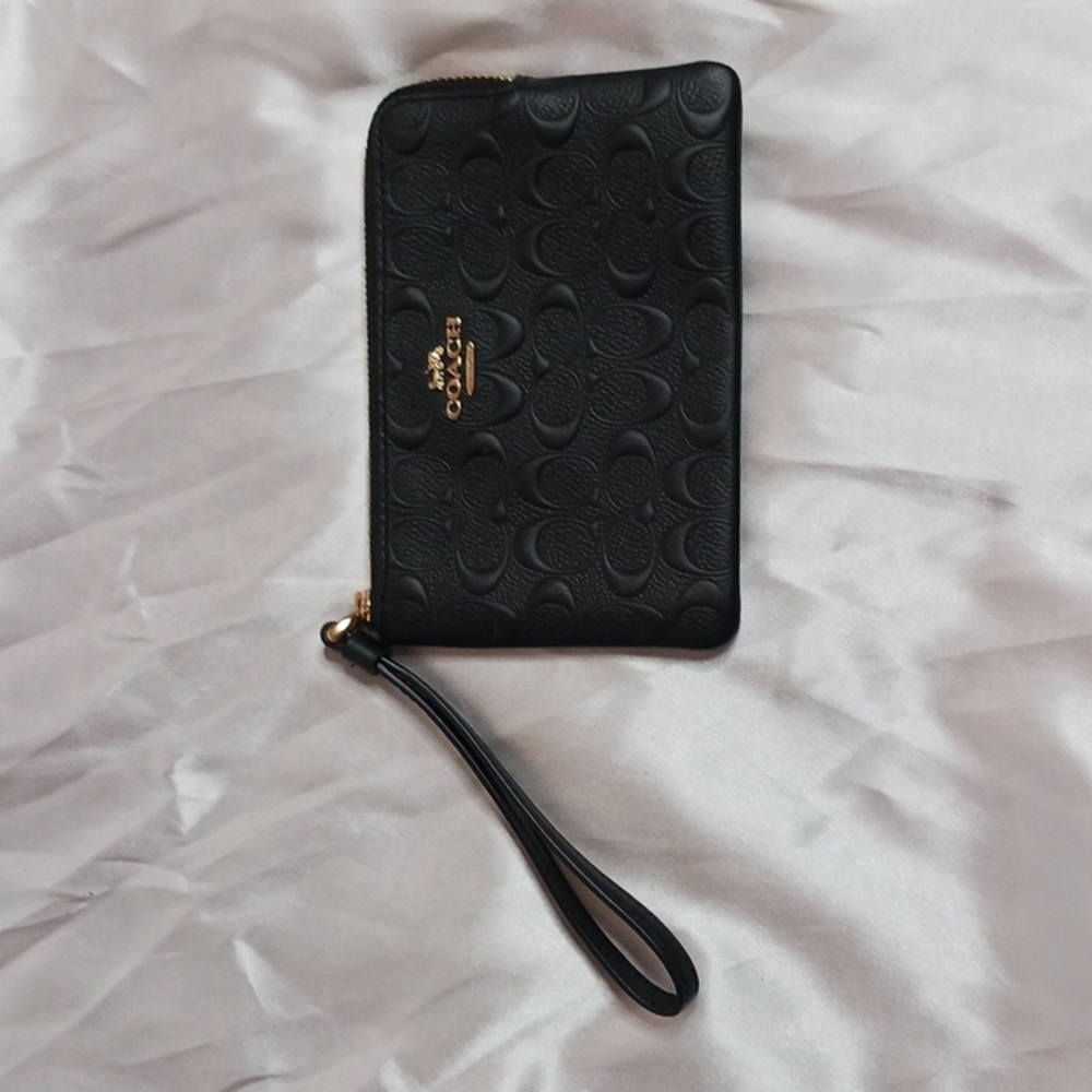 Wristlet... never used price includes tax